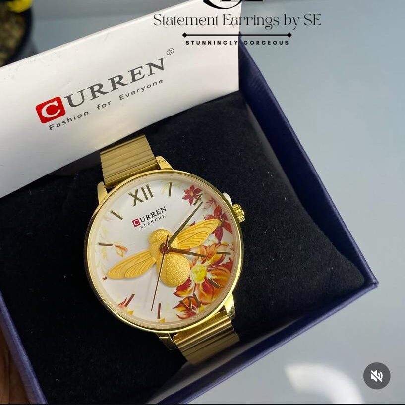 Home curren watch gold stainless steel and white